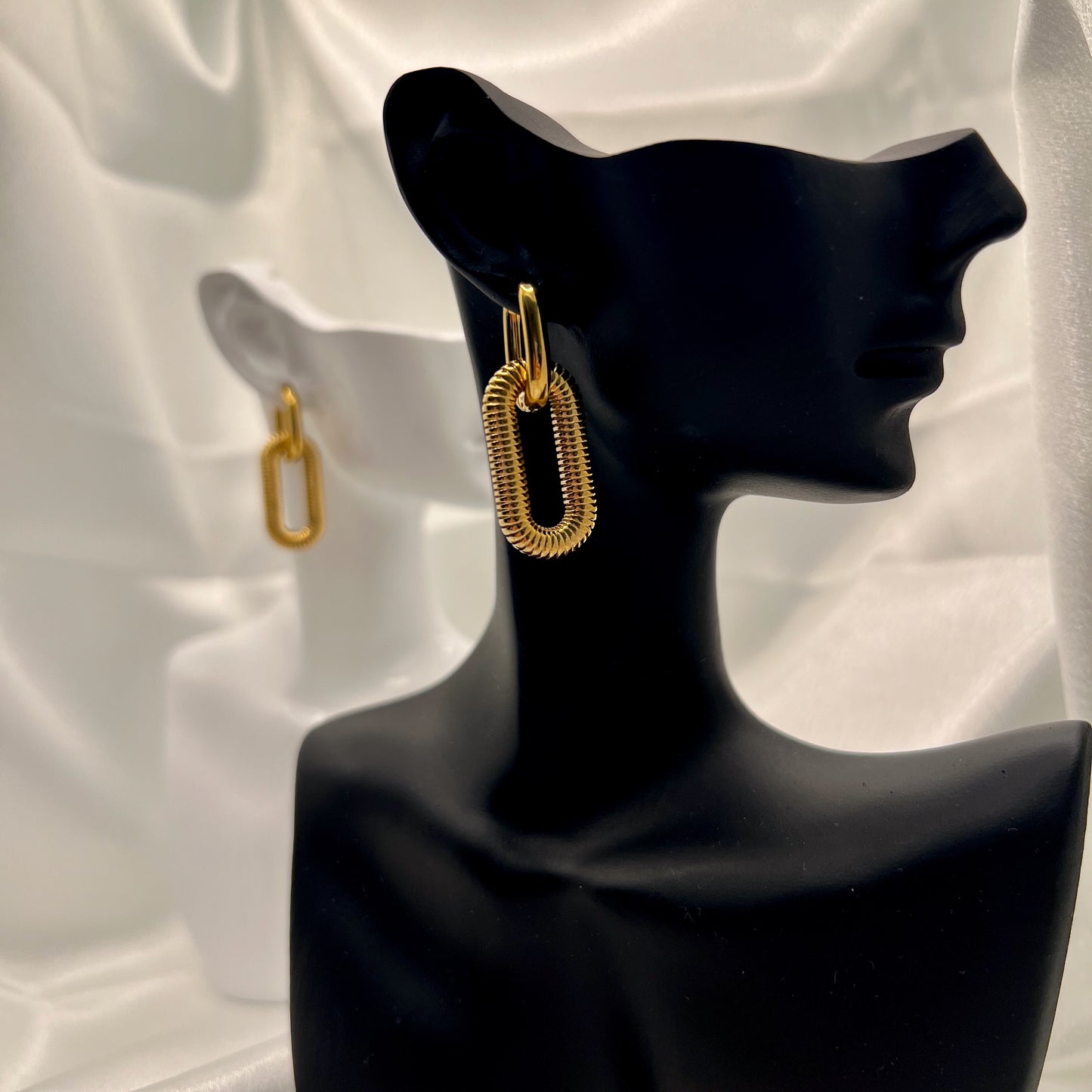 front view gold oval chain link earrings bold minimalist style
