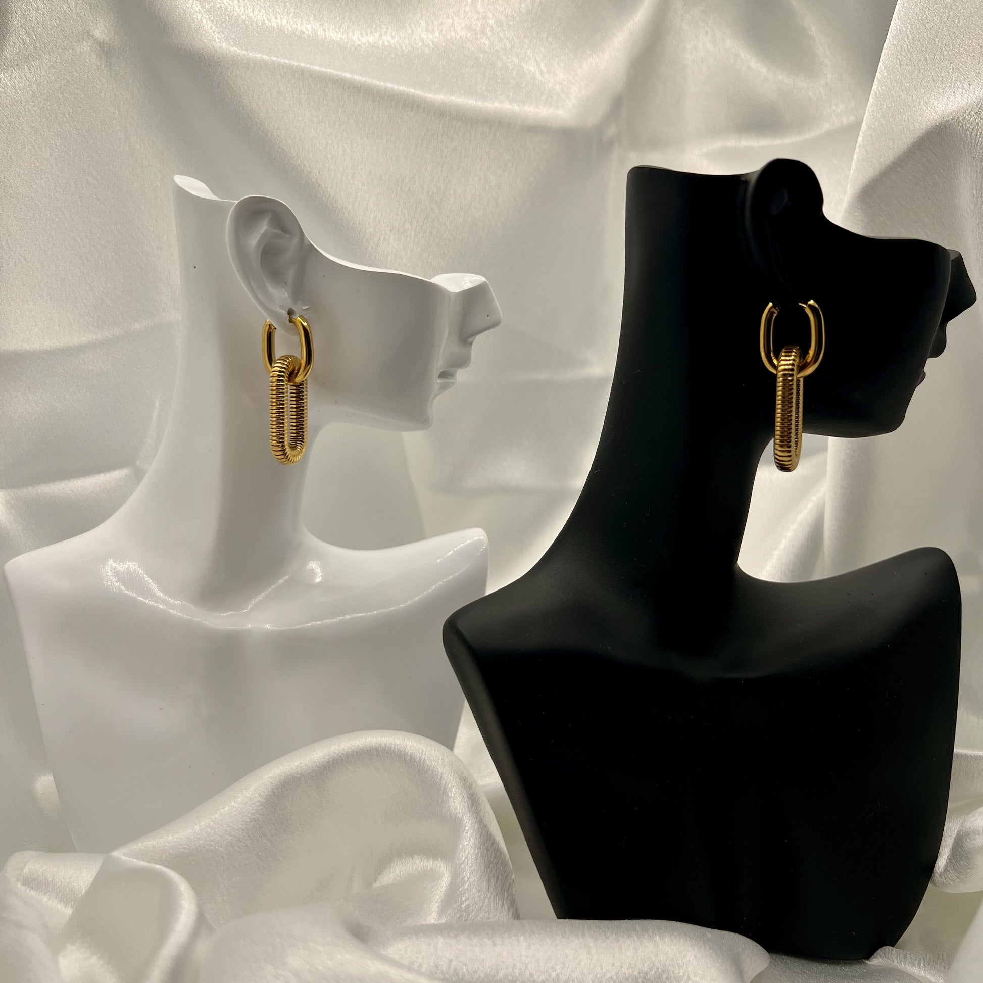 side view chunky gold link drop earrings modern statement jewelry